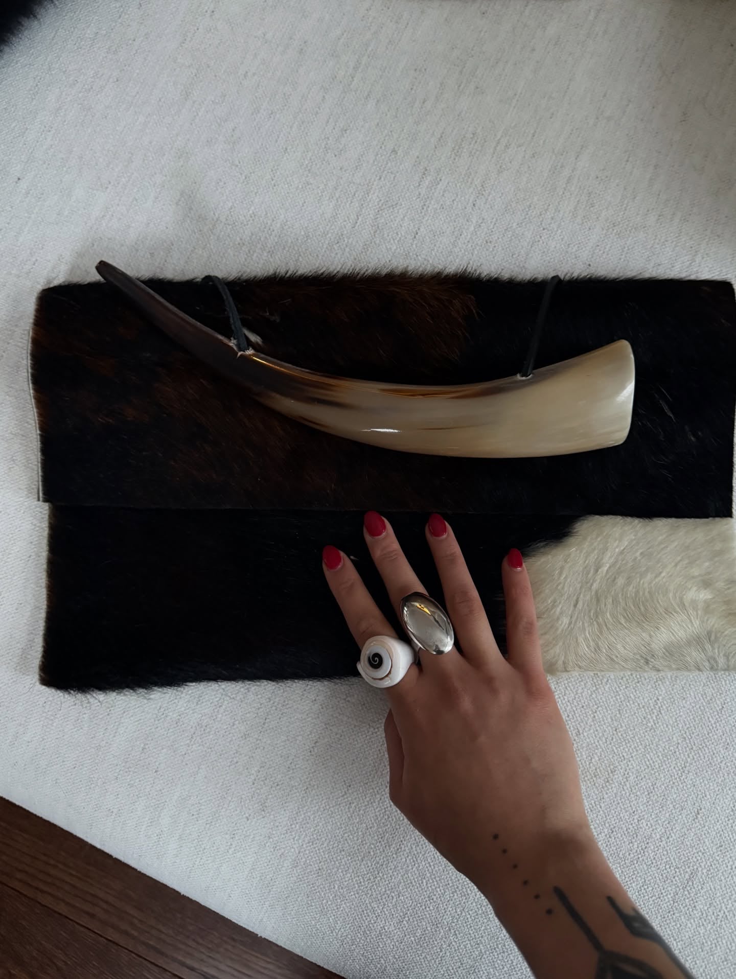 Horn Handle Cowhide Patchwork Clutch