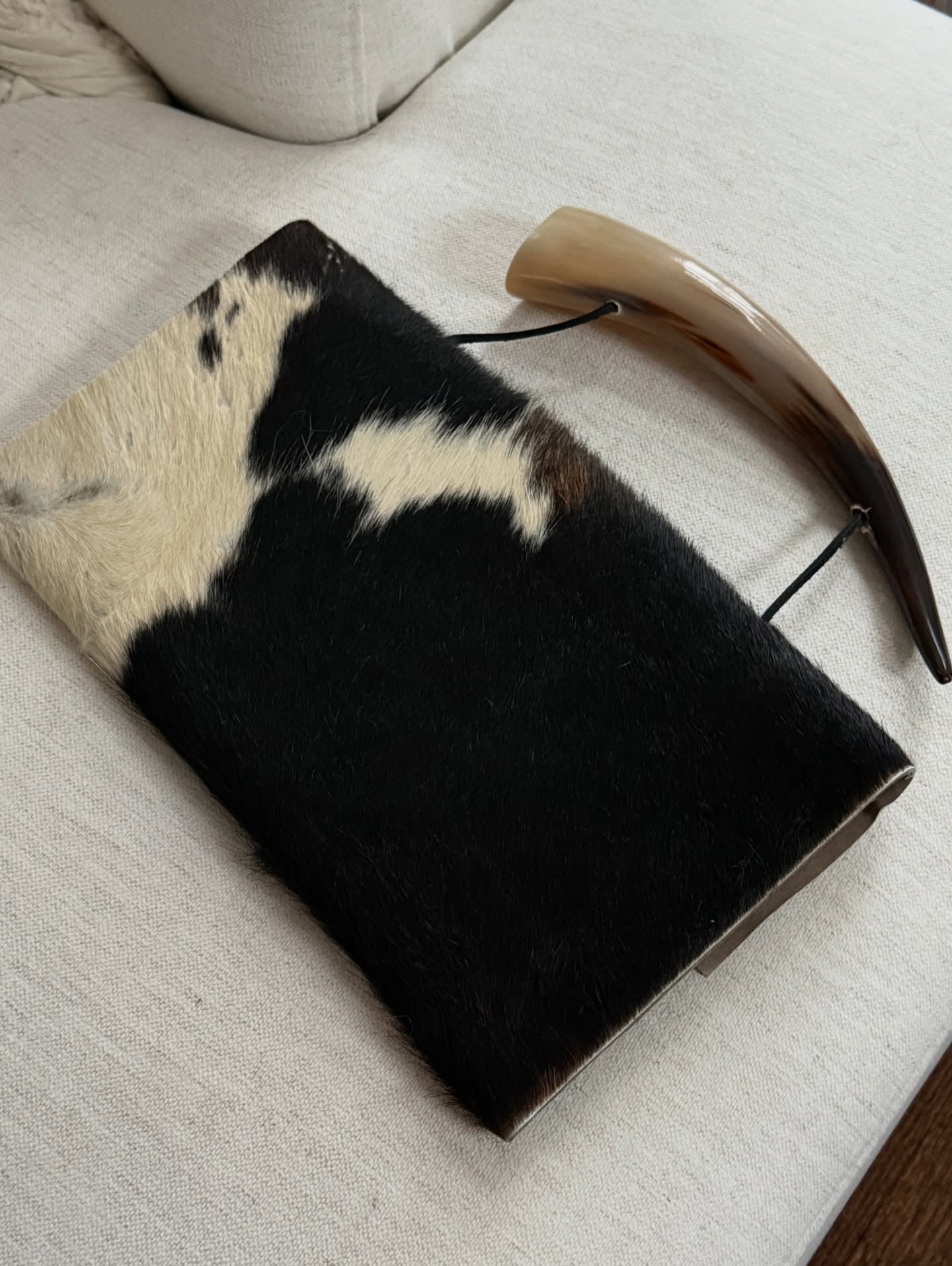 Horn Handle Cowhide Patchwork Clutch